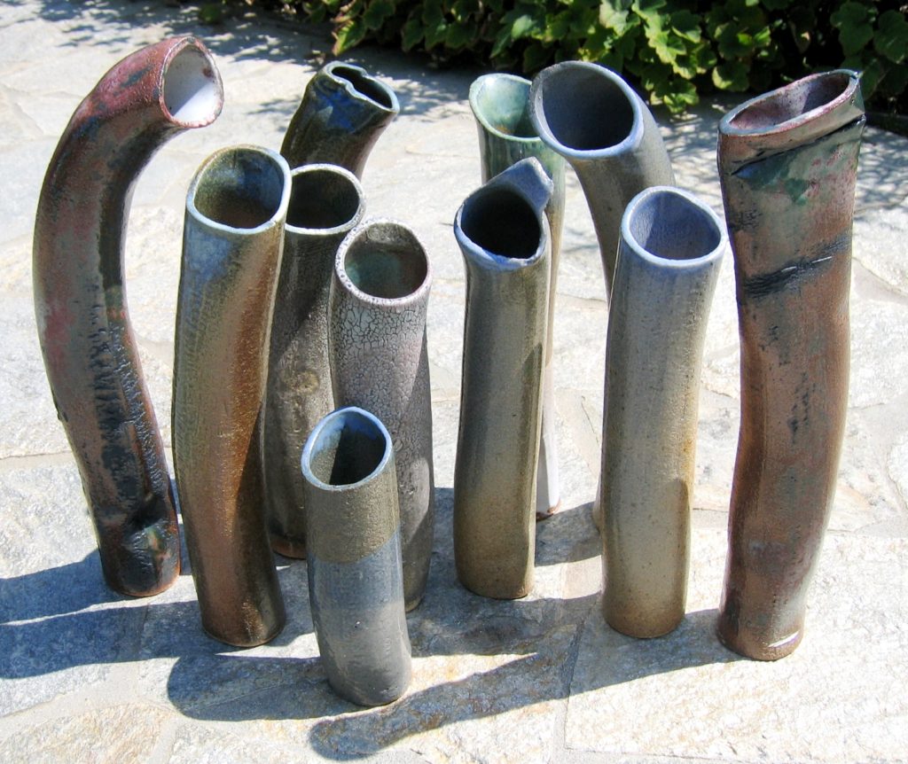 11 Cylinders  
 extruded, high fire stoneware, glaze
 I love to have them all in my garden!
